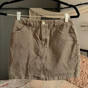 Small green mini skirt